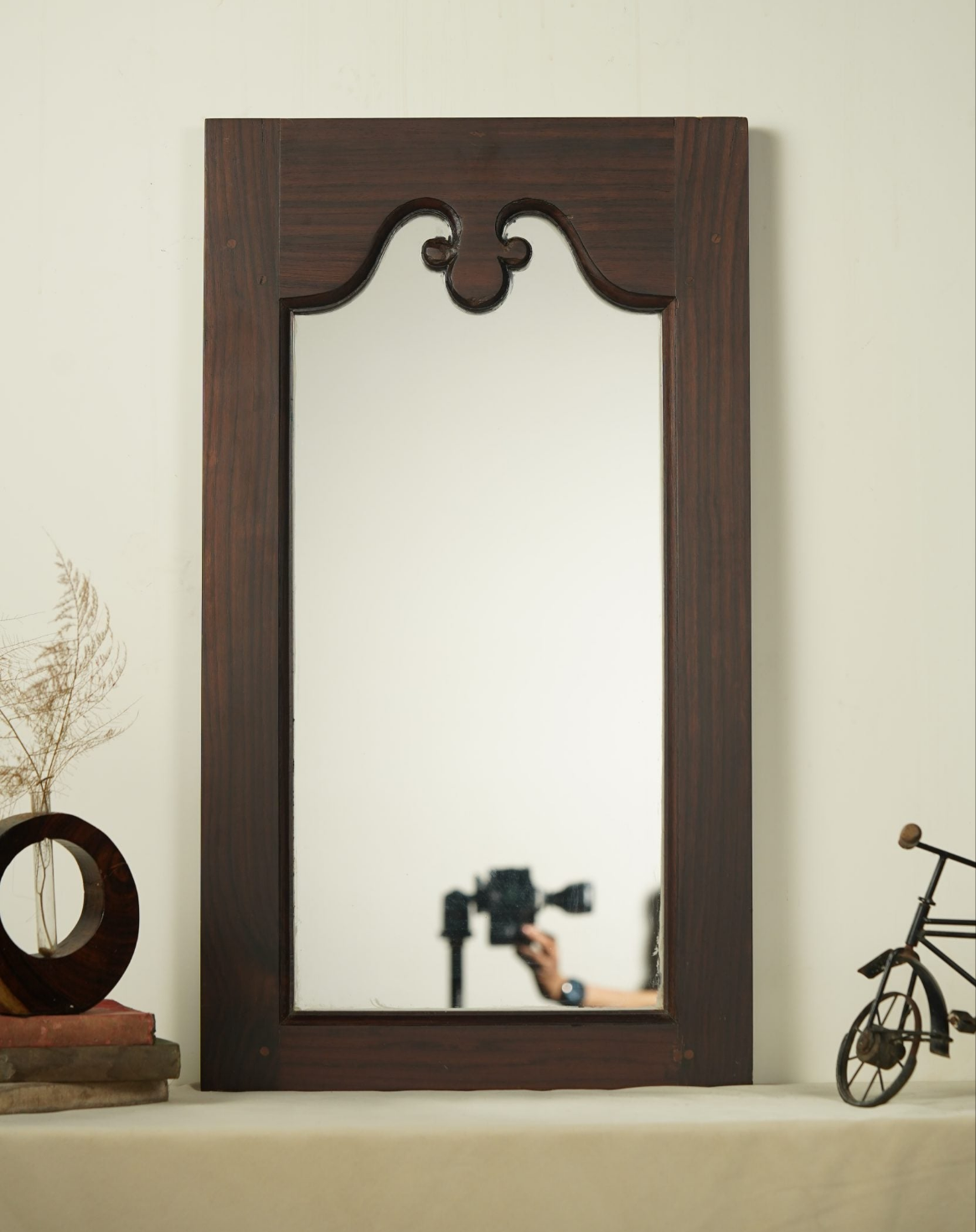 Moroccan-inspired teak wood Jharoka mirror.