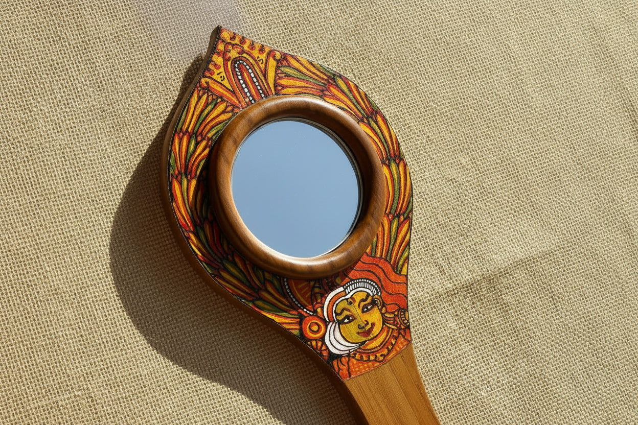 Decorative mirror with artistic design on a beige fabric background
