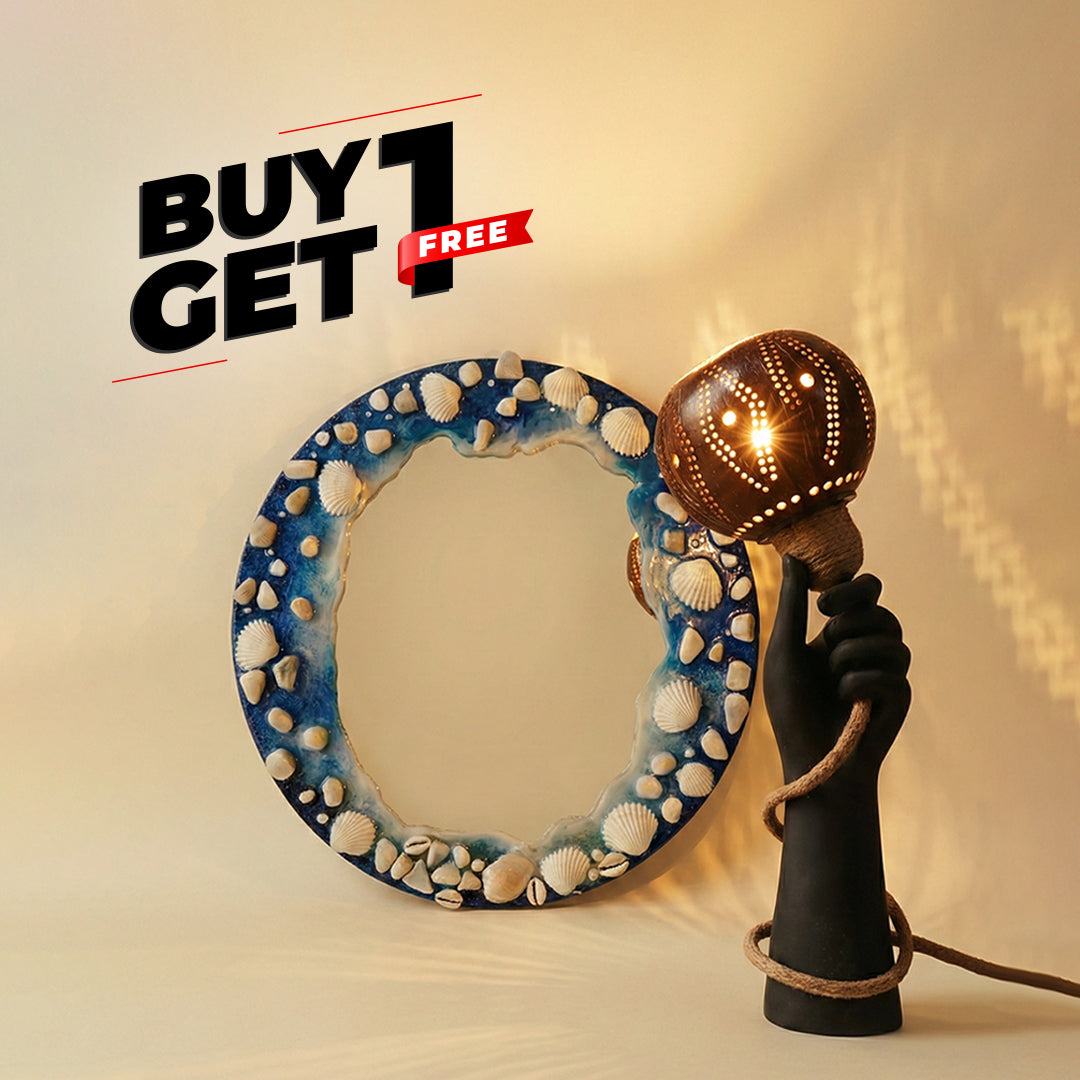 Decorative mirror with shell pattern and lamp shaped like a hand holding a light bulb on a beige background.