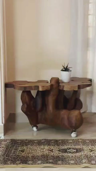 Wooden side table with natural design in a room setting